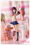 Sousai Shojo Teien feamle model kit in blue skirt and yellow top with her hands in the air