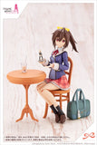 Sousai Shojo Teien Ao Gennai with a pink skirt and blue shirt sitting at table with green purse