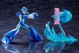 Mega Man X in iridescent armor shooting blaster with blue and pink effects